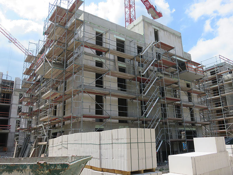 Neubau Wohnanlage „Am Henninger Turm“ Frankfurt, Errichtung von 12 Mehrfamilienhäusern, 1 Tiefgarage u. 2 Reihenhausgruppen